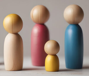Group of 4 coloured peg figures, fellowship concept