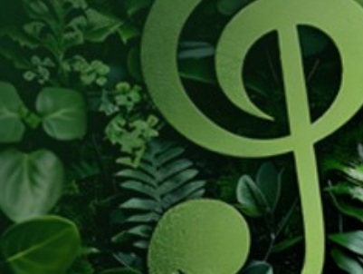 Treble clef on green garden background